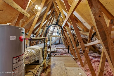 This home is situated on an expansive 3/4-acre homesite in one on Carolina Shores Golf Course in North Carolina - for sale on GolfHomes.com, golf home, golf lot