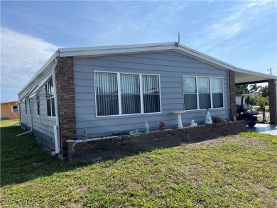 NEW FLOORS, NEW ROOF, INCLUDES PARK CERTIFICATE!!!! Come & Enjoy on Six Lakes Country Club in Florida - for sale on GolfHomes.com, golf home, golf lot