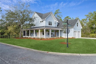 Welcome to this beautiful coastal-style home, tucked away in the on The Golf Club At Sanctuary Cove in Georgia - for sale on GolfHomes.com, golf home, golf lot