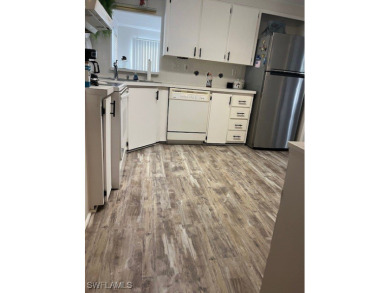 NEW FLOORS, NEW ROOF, INCLUDES PARK CERTIFICATE!!!! Come & Enjoy on Six Lakes Country Club in Florida - for sale on GolfHomes.com, golf home, golf lot
