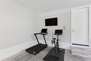 Welcome to this beautiful coastal-style home, tucked away in the on The Golf Club At Sanctuary Cove in Georgia - for sale on GolfHomes.com, golf home, golf lot