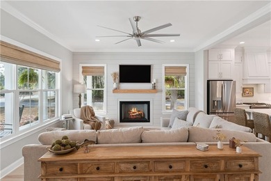 Welcome to this beautiful coastal-style home, tucked away in the on The Golf Club At Sanctuary Cove in Georgia - for sale on GolfHomes.com, golf home, golf lot