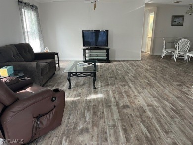 NEW FLOORS, NEW ROOF, INCLUDES PARK CERTIFICATE!!!! Come & Enjoy on Six Lakes Country Club in Florida - for sale on GolfHomes.com, golf home, golf lot