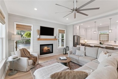 Welcome to this beautiful coastal-style home, tucked away in the on The Golf Club At Sanctuary Cove in Georgia - for sale on GolfHomes.com, golf home, golf lot