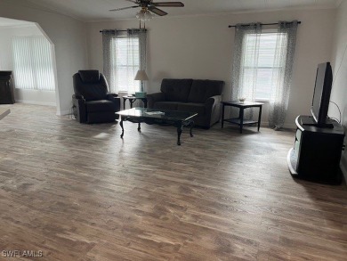 NEW FLOORS, NEW ROOF, INCLUDES PARK CERTIFICATE!!!! Come & Enjoy on Six Lakes Country Club in Florida - for sale on GolfHomes.com, golf home, golf lot