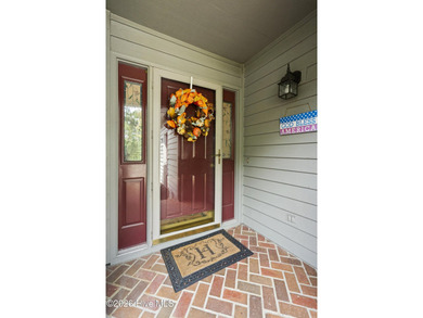 Welcome to this lovely, well-kept three-bedroom, two-bathroom on Olde Point Golf and Country Club in North Carolina - for sale on GolfHomes.com, golf home, golf lot