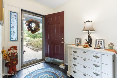 Welcome to this lovely, well-kept three-bedroom, two-bathroom on Olde Point Golf and Country Club in North Carolina - for sale on GolfHomes.com, golf home, golf lot