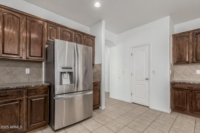 This beautiful 4-bedroom, 2-bathroom home in the sought-after on The Golf Club At Johnson Ranch in Arizona - for sale on GolfHomes.com, golf home, golf lot