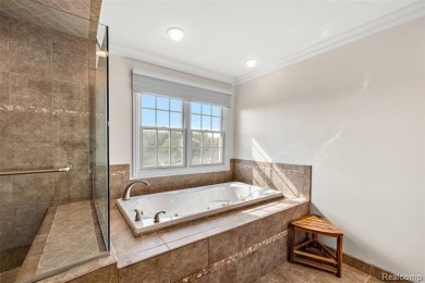 Experience luxury living in this beautifully renovated colonial on Forest Lake Country Club in Michigan - for sale on GolfHomes.com, golf home, golf lot