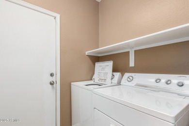 This beautiful 4-bedroom, 2-bathroom home in the sought-after on The Golf Club At Johnson Ranch in Arizona - for sale on GolfHomes.com, golf home, golf lot