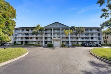 This 2 bedroom 2 bathroom 4th floor condo overlooking the golf on Pine Island Ridge Country Club in Florida - for sale on GolfHomes.com, golf home, golf lot