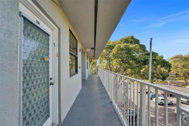 This 2 bedroom 2 bathroom 4th floor condo overlooking the golf on Pine Island Ridge Country Club in Florida - for sale on GolfHomes.com, golf home, golf lot