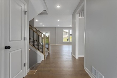 Welcome to *Brookside,* where luxury meets functionality in this on Heritage Park Golf Course in Kansas - for sale on GolfHomes.com, golf home, golf lot