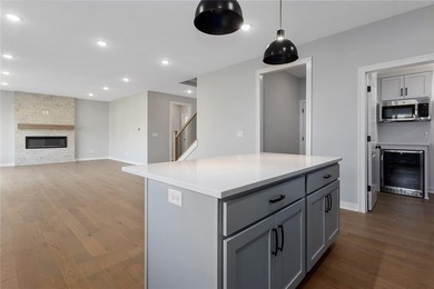 Welcome to *Brookside,* where luxury meets functionality in this on Heritage Park Golf Course in Kansas - for sale on GolfHomes.com, golf home, golf lot