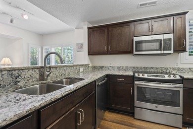 Welcome to this beautifully maintained first-floor 3-bedroom on Tidewater Golf Club and Plantation in South Carolina - for sale on GolfHomes.com, golf home, golf lot