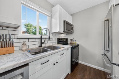 Spacious and updated 3-bedroom, 3-bath townhome with full on Lake Saint Louis Par 3 in Missouri - for sale on GolfHomes.com, golf home, golf lot