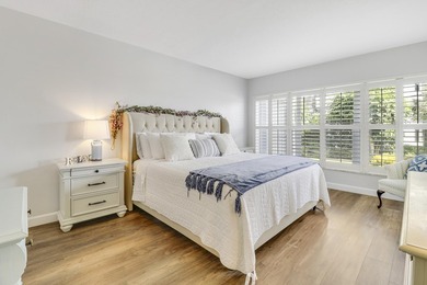 Wake up to serene marina views from your own patio in the heart on North Palm Beach Country Club in Florida - for sale on GolfHomes.com, golf home, golf lot