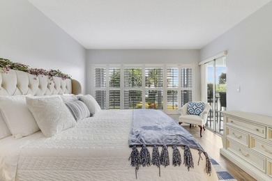 Wake up to serene marina views from your own patio in the heart on North Palm Beach Country Club in Florida - for sale on GolfHomes.com, golf home, golf lot