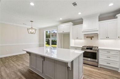 This stunning two-story home by local builder Josselyn Homes on Laurel Island Links in Georgia - for sale on GolfHomes.com, golf home, golf lot