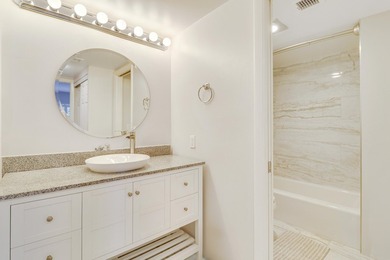 Wake up to serene marina views from your own patio in the heart on North Palm Beach Country Club in Florida - for sale on GolfHomes.com, golf home, golf lot