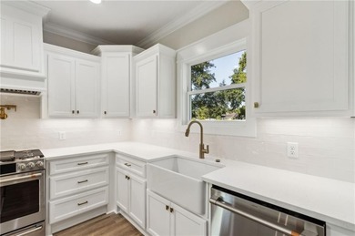 This stunning two-story home by local builder Josselyn Homes on Laurel Island Links in Georgia - for sale on GolfHomes.com, golf home, golf lot