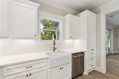 This stunning two-story home by local builder Josselyn Homes on Laurel Island Links in Georgia - for sale on GolfHomes.com, golf home, golf lot