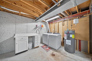 Spacious and updated 3-bedroom, 3-bath townhome with full on Lake Saint Louis Par 3 in Missouri - for sale on GolfHomes.com, golf home, golf lot