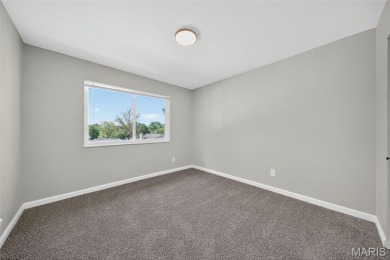 Spacious and updated 3-bedroom, 3-bath townhome with full on Lake Saint Louis Par 3 in Missouri - for sale on GolfHomes.com, golf home, golf lot