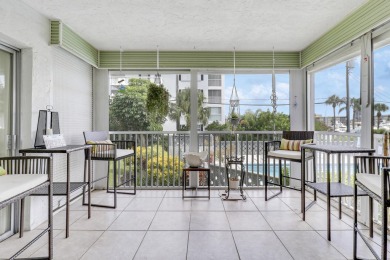 Wake up to serene marina views from your own patio in the heart on North Palm Beach Country Club in Florida - for sale on GolfHomes.com, golf home, golf lot
