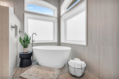 Welcome to 11451 Compass Point Drive in the exclusive Edgewater on Gulf Harbour Yacht and Country Club in Florida - for sale on GolfHomes.com, golf home, golf lot