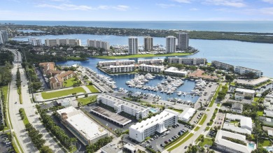 Wake up to serene marina views from your own patio in the heart on North Palm Beach Country Club in Florida - for sale on GolfHomes.com, golf home, golf lot