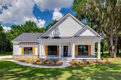 Come See this Beautiful New Construction by Merit Homes in on Sapelo Hammock Golf Club in Georgia - for sale on GolfHomes.com, golf home, golf lot