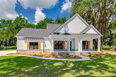 Come See this Beautiful New Construction by Merit Homes in on Sapelo Hammock Golf Club in Georgia - for sale on GolfHomes.com, golf home, golf lot