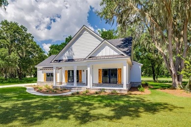 Come See this Beautiful New Construction by Merit Homes in on Sapelo Hammock Golf Club in Georgia - for sale on GolfHomes.com, golf home, golf lot