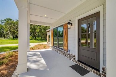 Come See this Beautiful New Construction by Merit Homes in on Sapelo Hammock Golf Club in Georgia - for sale on GolfHomes.com, golf home, golf lot