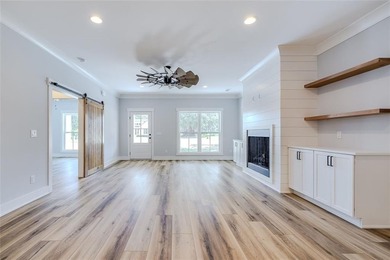 Come See this Beautiful New Construction by Merit Homes in on Sapelo Hammock Golf Club in Georgia - for sale on GolfHomes.com, golf home, golf lot