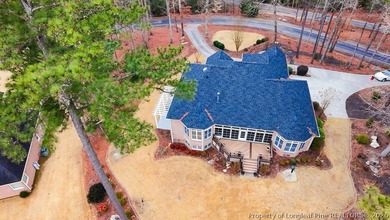 Golf-front living at its best in the gated community of Carolina on Carolina Trace Country Club in North Carolina - for sale on GolfHomes.com, golf home, golf lot