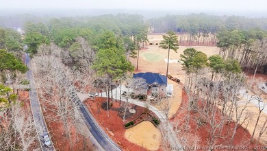 Golf-front living at its best in the gated community of Carolina on Carolina Trace Country Club in North Carolina - for sale on GolfHomes.com, golf home, golf lot