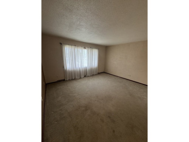 This well-kept split-level home in Winner, SD offers 1,044 sq ft on Winner Country Club in South Dakota - for sale on GolfHomes.com, golf home, golf lot