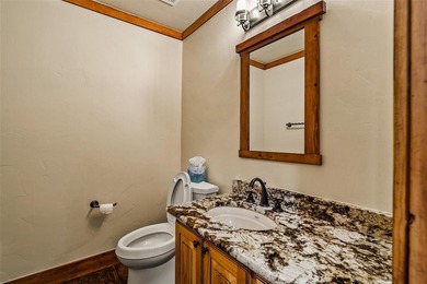 Set on 14 pristine acres along the Swan River, 2717 Tiger Road on Breckenridge Golf Club in Colorado - for sale on GolfHomes.com, golf home, golf lot