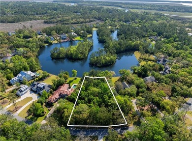This remarkable lakefront lot spans just under one acre (0.90) on The King and Prince Golf Course, Home of the Hampton Club in Georgia - for sale on GolfHomes.com, golf home, golf lot