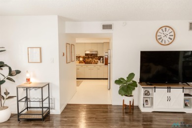 VINTAGE charm meets URBAN flair in this stylish townhome tucked on Chaparral Country Club in New Mexico - for sale on GolfHomes.com, golf home, golf lot