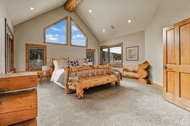 Set on 14 pristine acres along the Swan River, 2717 Tiger Road on Breckenridge Golf Club in Colorado - for sale on GolfHomes.com, golf home, golf lot