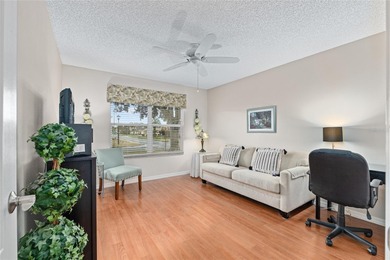 Nestled on a desirable corner homesite shaded by majestic live on Hacienda Hills Golf and Country Club in Florida - for sale on GolfHomes.com, golf home, golf lot