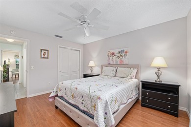 Nestled on a desirable corner homesite shaded by majestic live on Hacienda Hills Golf and Country Club in Florida - for sale on GolfHomes.com, golf home, golf lot