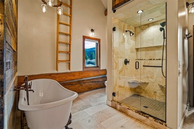 Set on 14 pristine acres along the Swan River, 2717 Tiger Road on Breckenridge Golf Club in Colorado - for sale on GolfHomes.com, golf home, golf lot