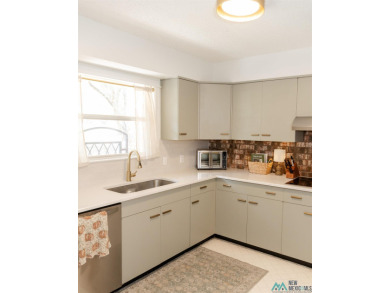 VINTAGE charm meets URBAN flair in this stylish townhome tucked on Chaparral Country Club in New Mexico - for sale on GolfHomes.com, golf home, golf lot
