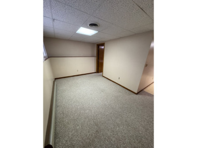 This well-kept split-level home in Winner, SD offers 1,044 sq ft on Winner Country Club in South Dakota - for sale on GolfHomes.com, golf home, golf lot