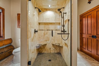 Set on 14 pristine acres along the Swan River, 2717 Tiger Road on Breckenridge Golf Club in Colorado - for sale on GolfHomes.com, golf home, golf lot