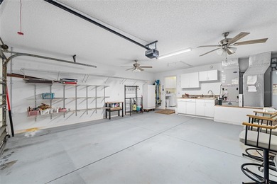 Nestled on a desirable corner homesite shaded by majestic live on Hacienda Hills Golf and Country Club in Florida - for sale on GolfHomes.com, golf home, golf lot